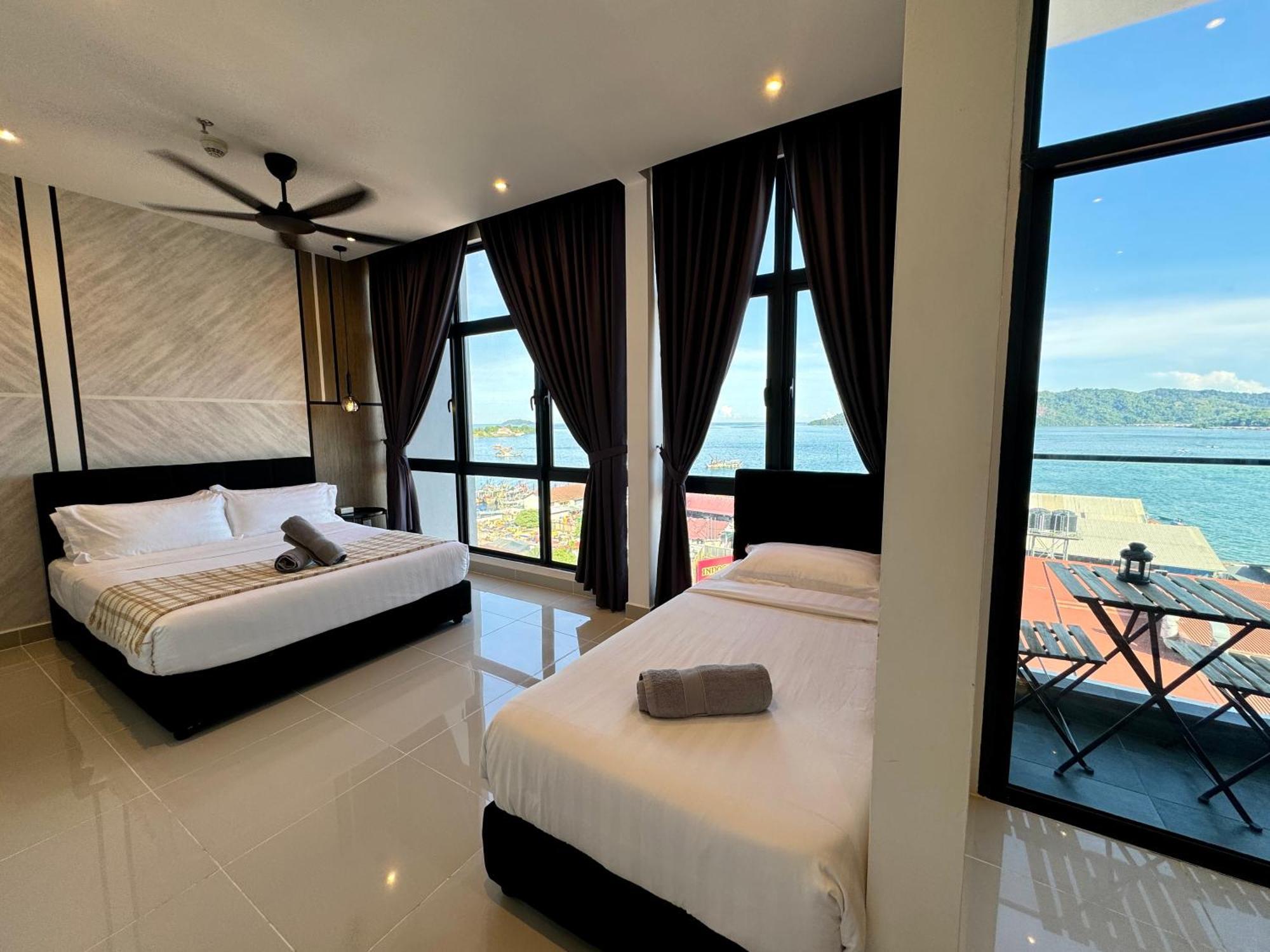 The Shore Cbd Kota Kinabalu By Laxzone Suite Bagian luar foto