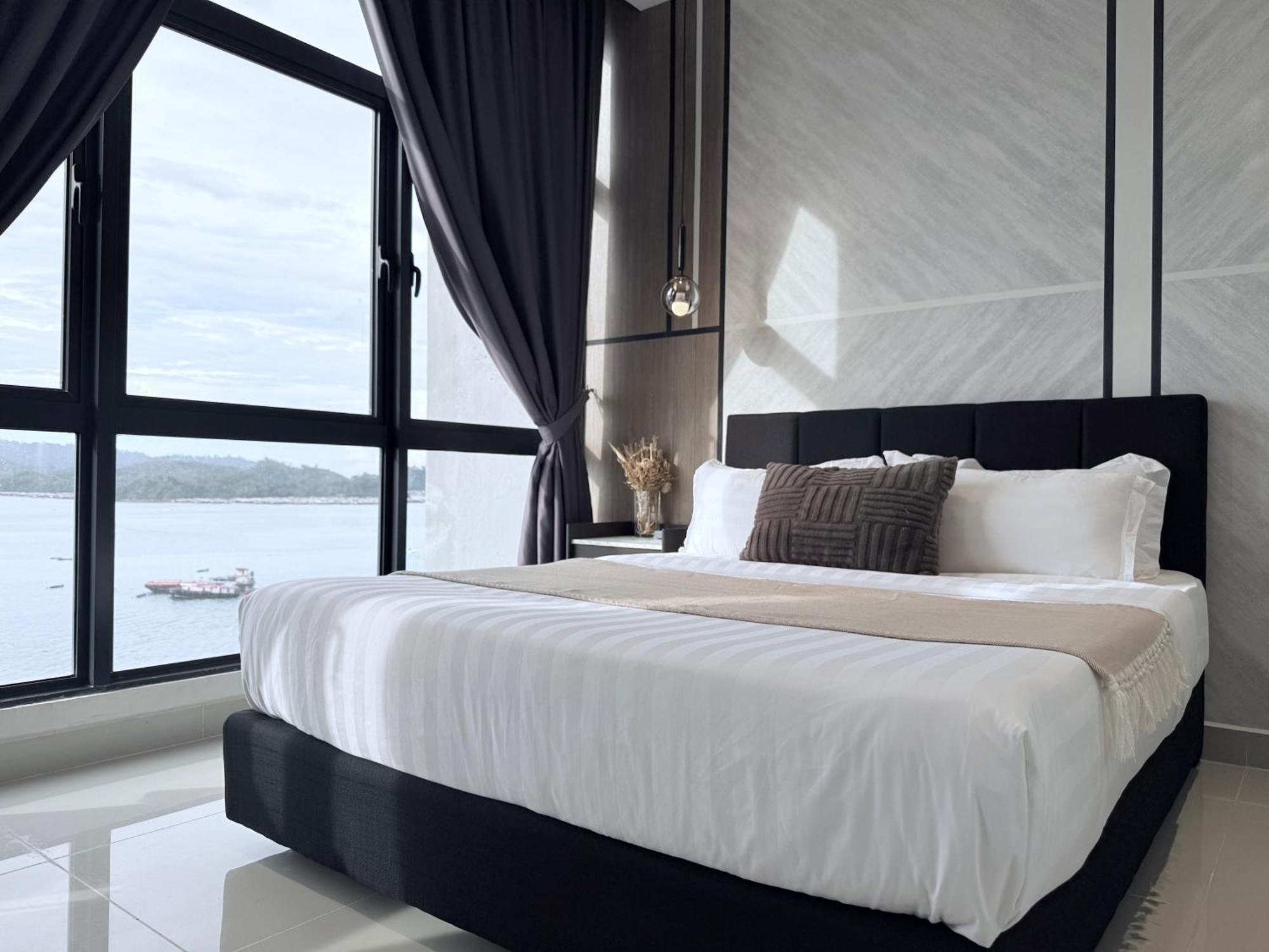 The Shore Cbd Kota Kinabalu By Laxzone Suite Bagian luar foto