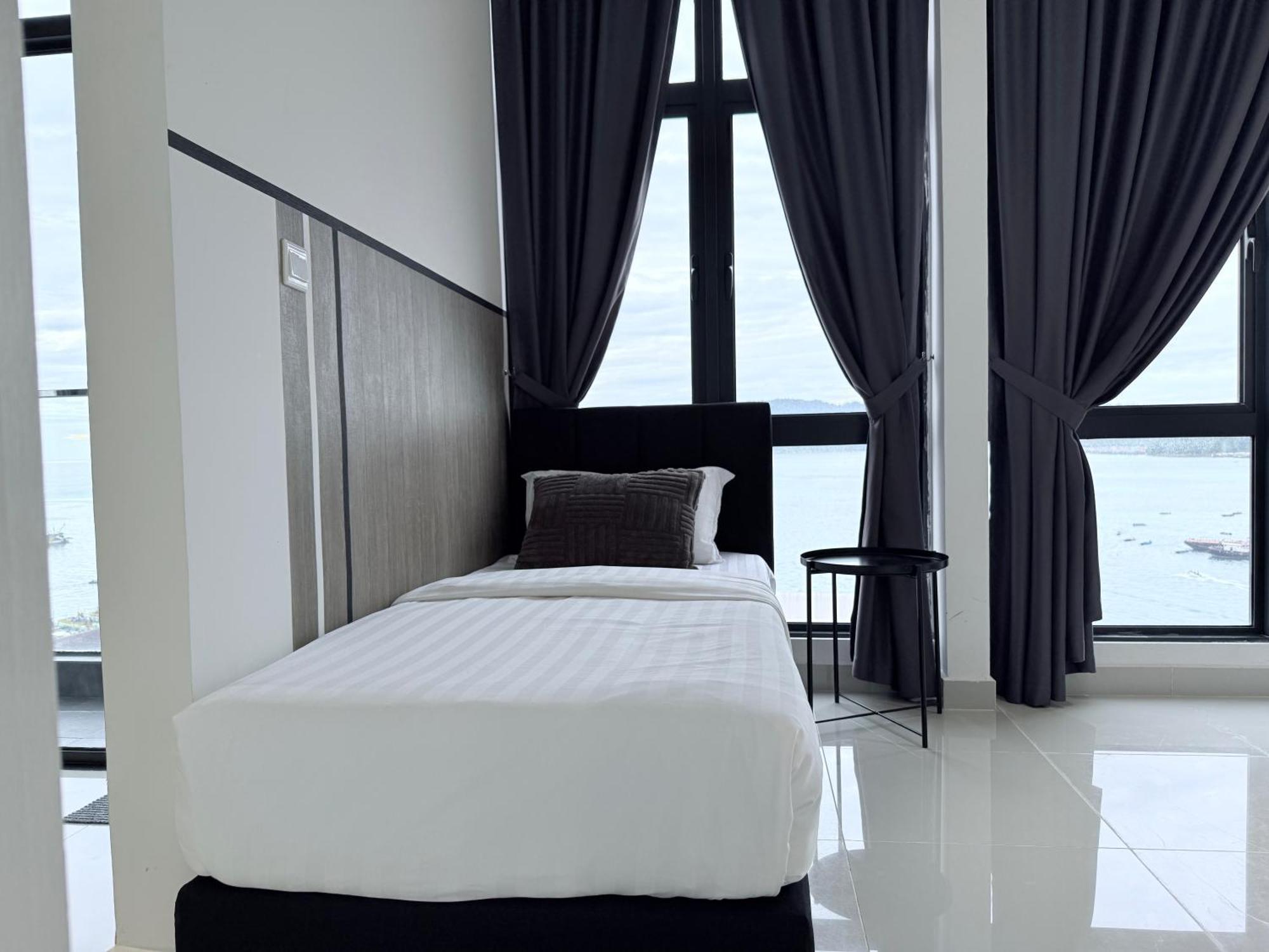 The Shore Cbd Kota Kinabalu By Laxzone Suite Bagian luar foto